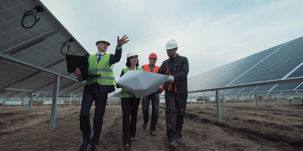 engineers discussing solar structures