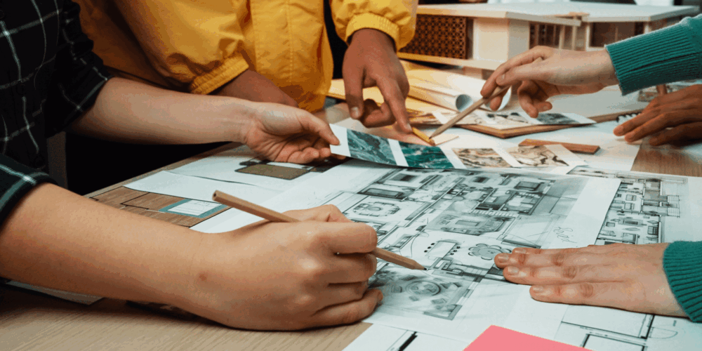 architects designing a building