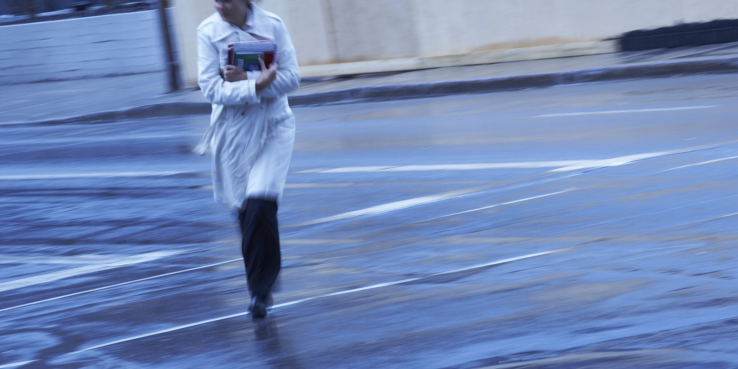 woman walking in the wind