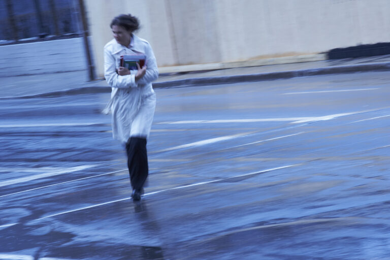 woman walking in the wind