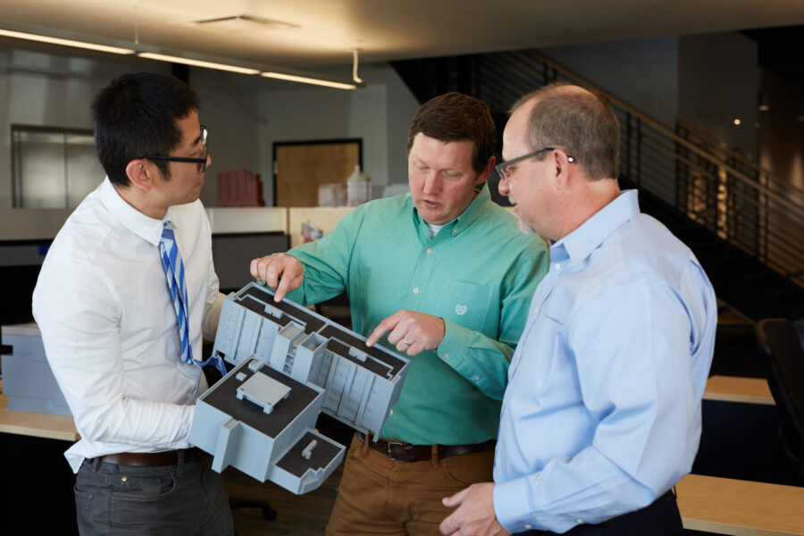 consultants discussing a model